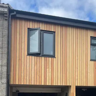 Timbersource's North American Douglas Fir Cladding on the side of a building