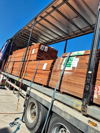 Packs of sawn West African Sapele arriving by lorry to Timbersource in Somerset