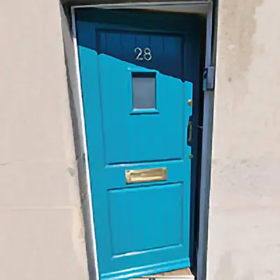A blue painted door made from Timbersource's Meranti