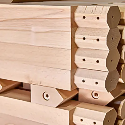 A stack of many components machined in Timbersource's Somerset mill using European Beech