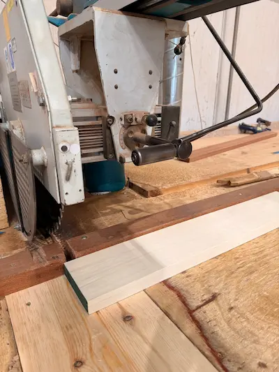 Thousands of component American Poplar pieces being cross cut at Timbersource's mill in somerset