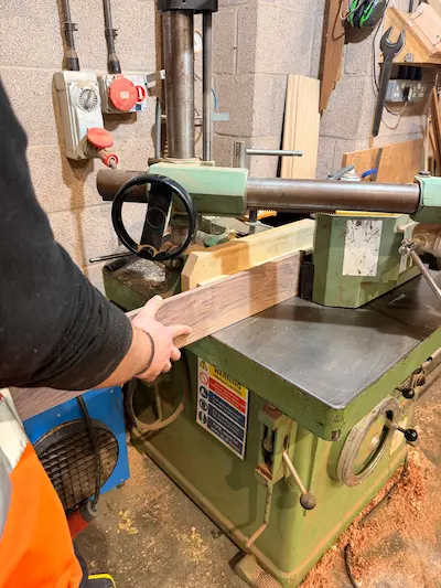 A piece of American Walnut being machined at Timbersource's Somerset mill