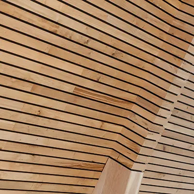 A curved ceiling with Oak Strips goin length ways