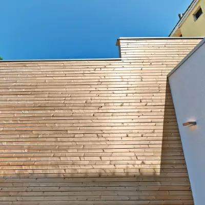 The side of a building clad in Timbersource's British Larch