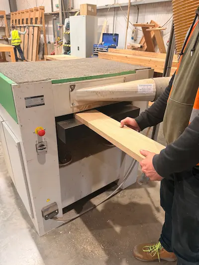 A piece of European Oak coming out of the thicknesser and Timbersource's Somerset mill