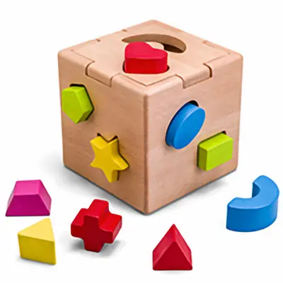 A Children's cube toy to put different coloured shapes into the cube made from European Beech from Timbersource